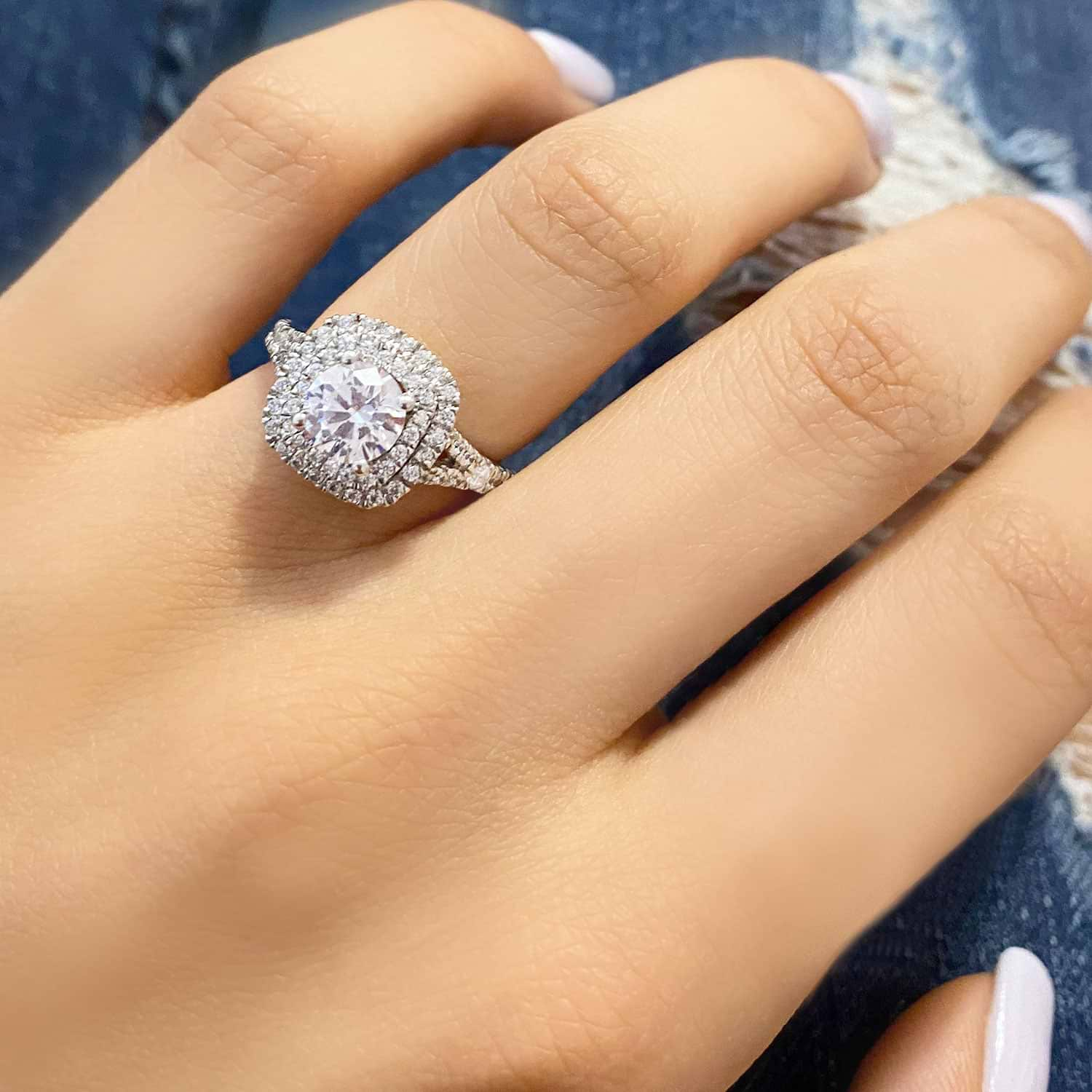 Double Halo Engagement Ring On Finger