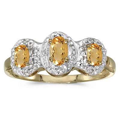 0.62tcw Oval Citrine and Diamond Three Stone Ring 14k Yellow Gold