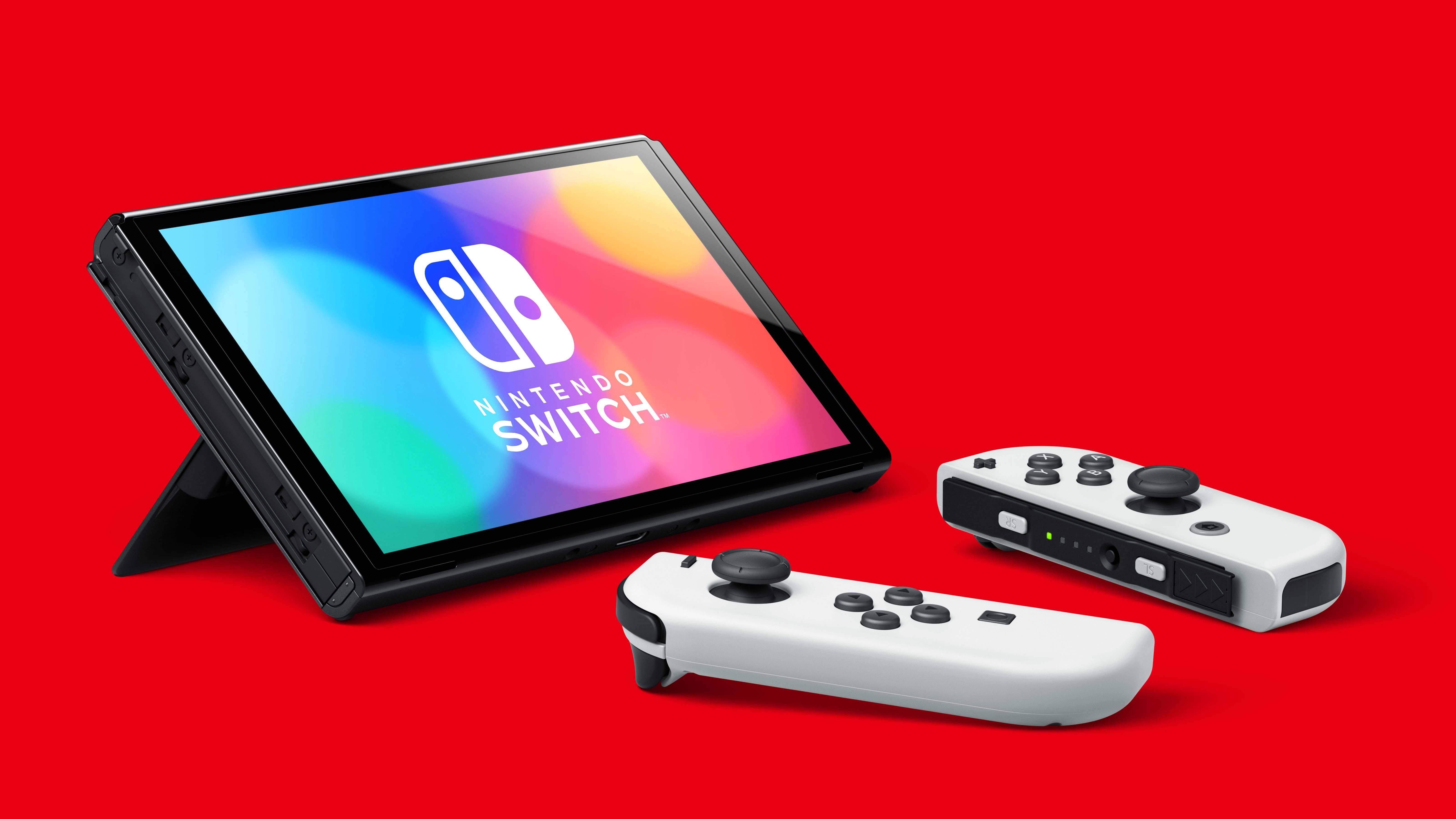 באנדל קונסולת Nintendo Switch OLED הכולל משחק Mario Kart 8 Deluxe ומנוי Nintendo Switch Online ל-3 חודשים - צבע כחול ואדום שנתיים אחריות ע"י היבואן הרשמי