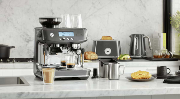 מכונת אספרסו משולבת מטחנת קפה Breville BES878BST - צבע נירוסטה מושחרת אחריות ע"י היבואן הרשמי