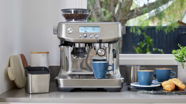 מכונת אספרסו משולבת מטחנת קפה Breville BES878BSS - צבע נירוסטה שנתיים אחריות ע"י היבואן הרשמי