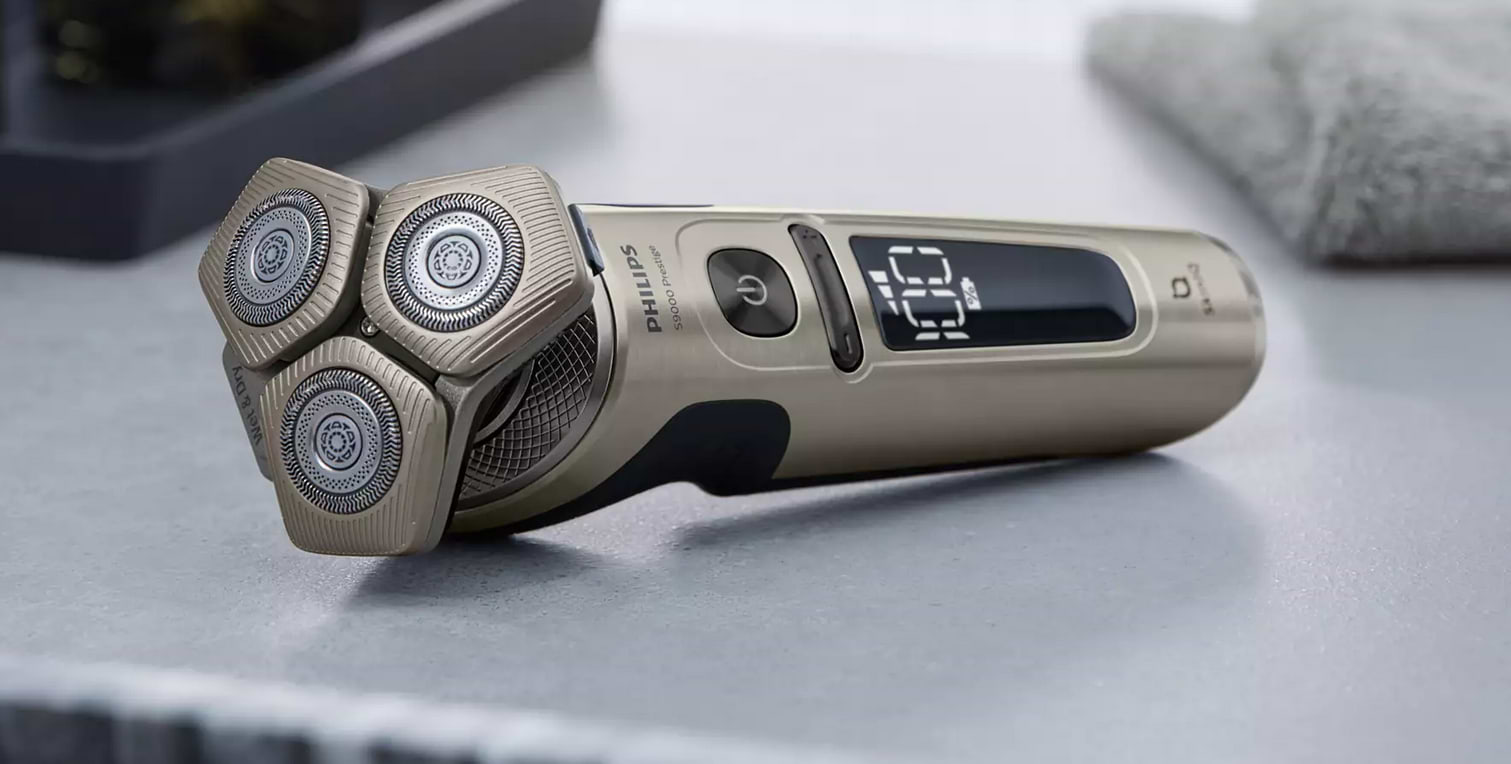 מכונת גילוח חשמלית לשימוש יבש ורטוב עם Philips SP9883/35 SkinIQ - שנתיים אחריות ע"י היבואן הרשמי